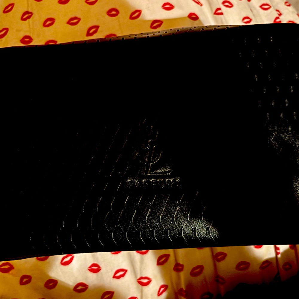 Brand new YSL COSMETICS bag